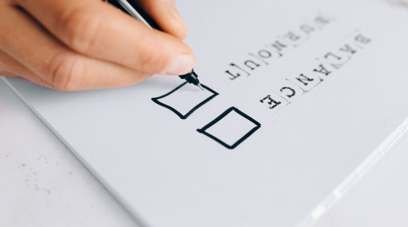 Close-up Photo of Checklist on White Paper