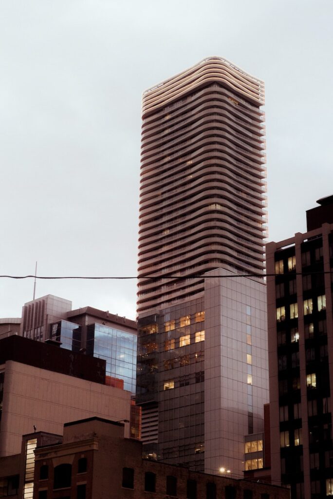 Modern skyscraper against cloudless sky