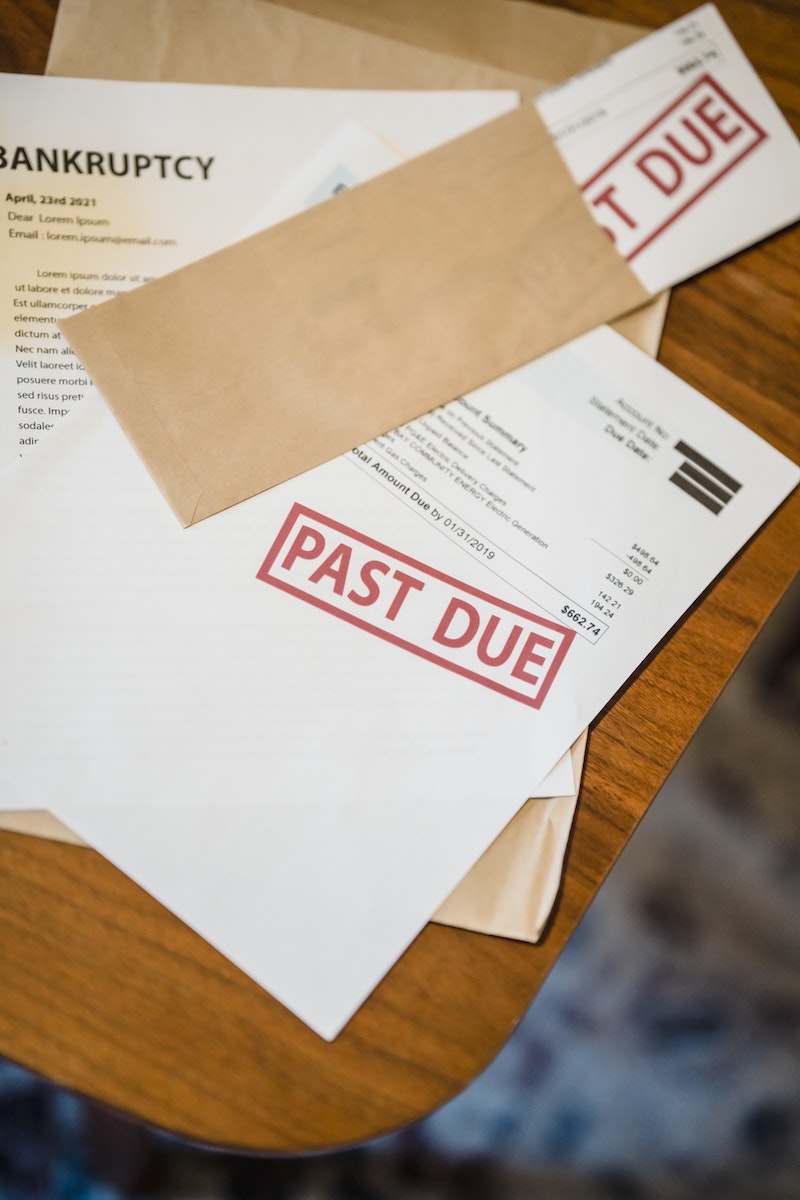 Past Due and Bankruptcy Papers on Table
