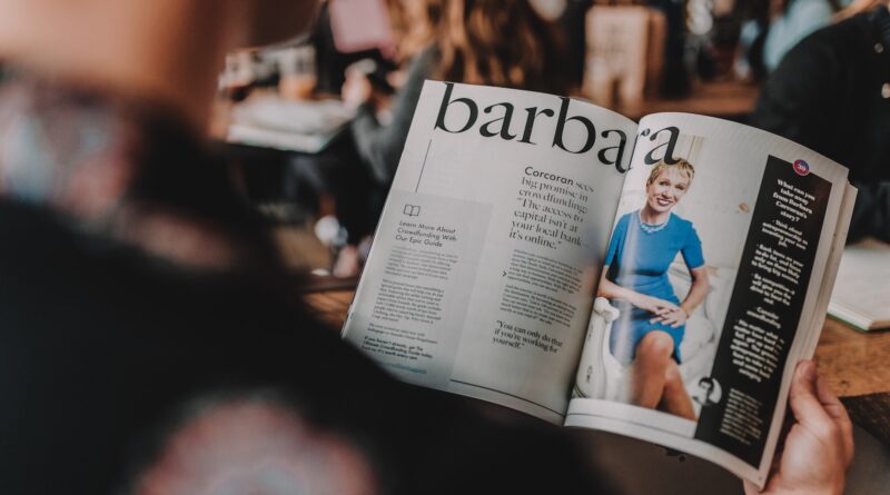 person reading Barbara magazine
